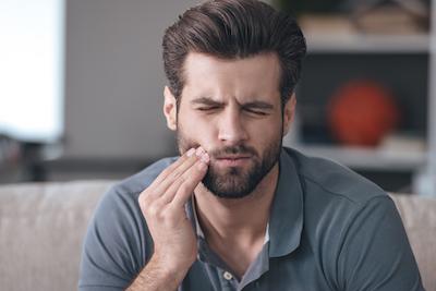 man with a toothache in Las Vegas