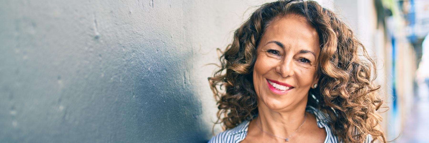 woman smiling on the street