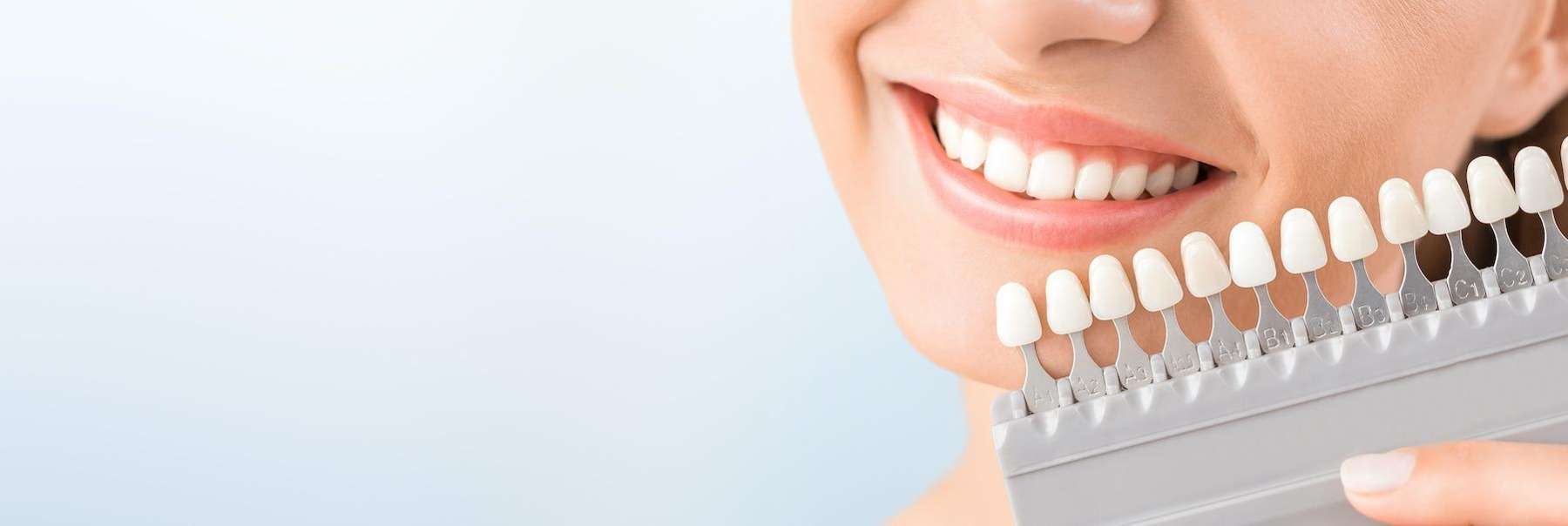 woman deciding on teeth whitening services